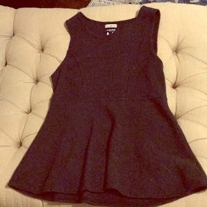 Wool sleeveless maternity tunic.